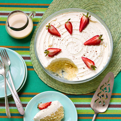 Tres Leches cake made in the microwave using the glass Anyday dish, resulting in a moist, rich cake soaked in three types of milk for a decadent treat. Enjoy a quick and indulgent dessert, ready in minutes.
