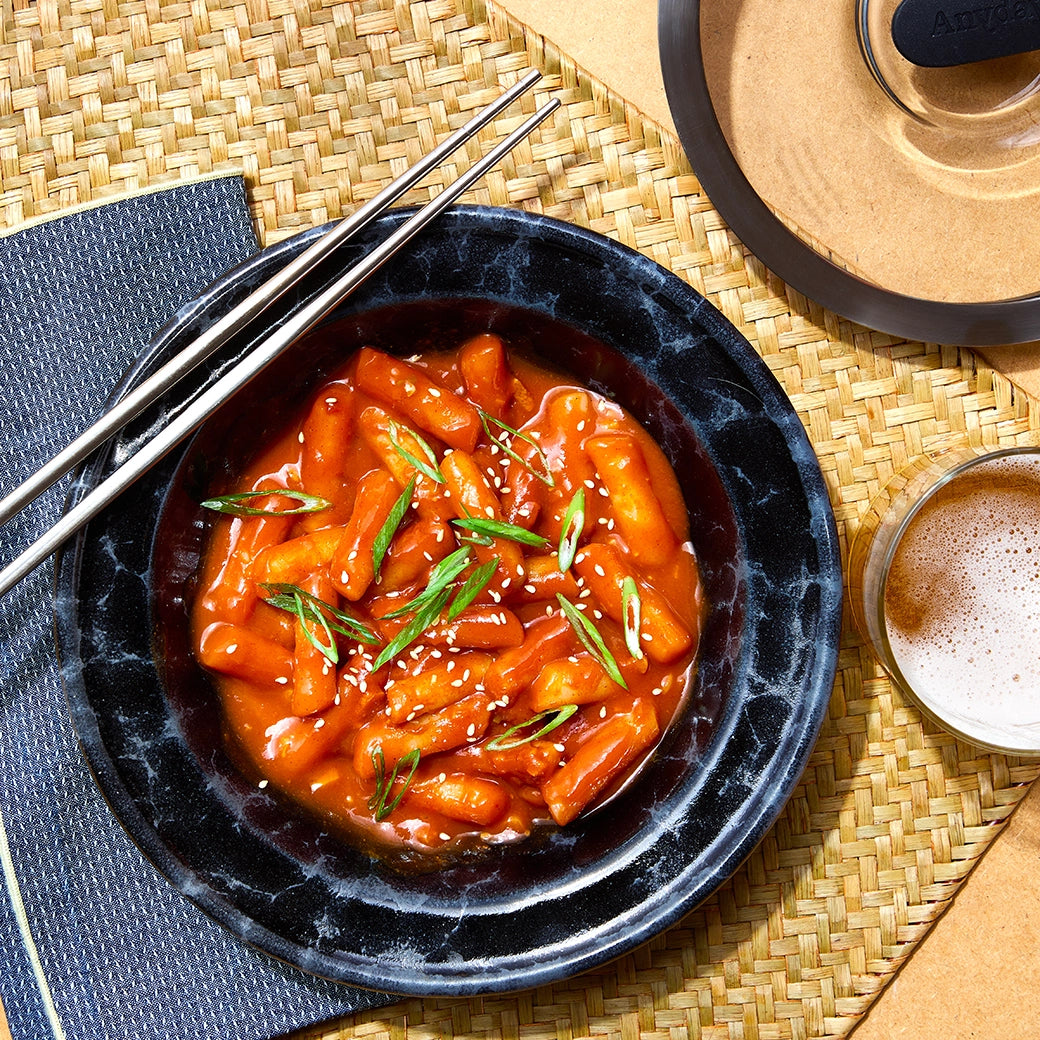 Easy Tteokbokki made in the microwave using the glass Anyday dish, delivering tender rice cakes coated in a spicy, savory sauce. Enjoy a quick and satisfying Korean-inspired meal, ready in minutes.