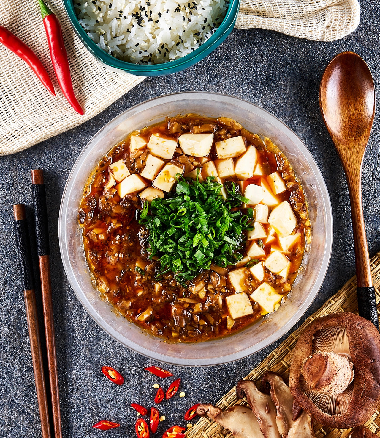 Vegan mapo tofu made in the microwave using the glass Anyday dish, delivering tender tofu infused with a spicy, savory sauce. Enjoy a quick and flavorful plant-based meal, ready in minutes.