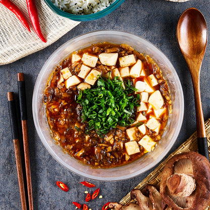 Vegan mapo tofu made in the microwave using the glass Anyday dish, delivering tender tofu infused with a spicy, savory sauce. Enjoy a quick and flavorful plant-based meal, ready in minutes.