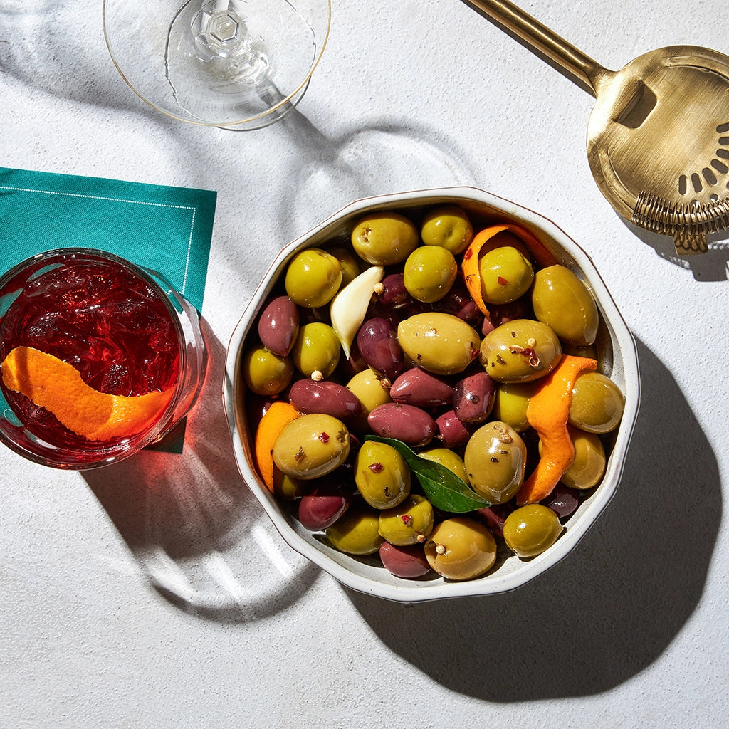 Warm marinated olives made in the microwave using the glass Anyday dish, offering perfectly seasoned and tender olives with rich, aromatic flavors. Enjoy a quick and savory appetizer, ready in minutes.