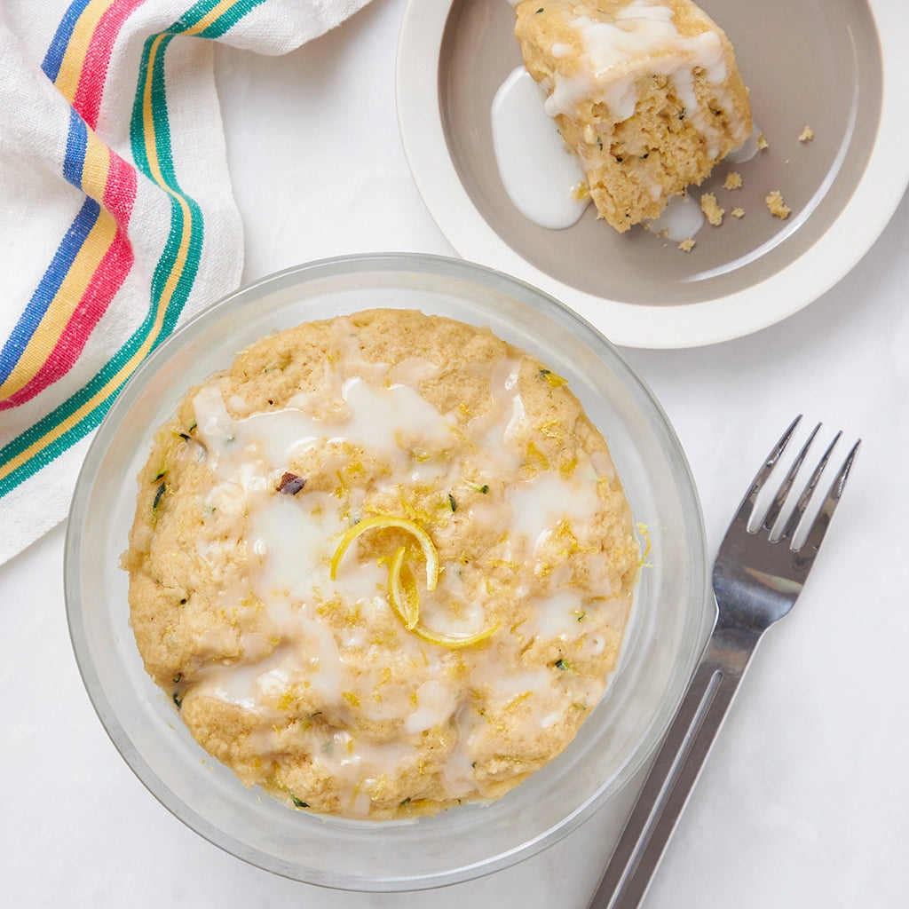 Moist zucchini bread made in the microwave using the glass Anyday dish, combining fresh zucchini with warm spices for a delicious and tender loaf. Enjoy a quick and wholesome treat, ready in minutes.