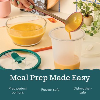 A ladle pours yellow soup from a glass bowl into a black The Everything but the Microwave Bundle cookware piece, with its matching glass lid resting nearby.