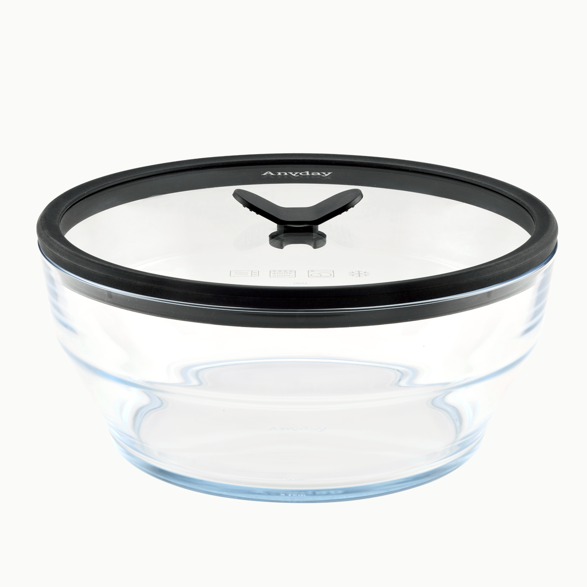 The Anyday 12-Cup Glass Round Deep Dish in Black Sesame is an empty, clear glass container with a black silicone lid featuring a central knob and the Anyday logo on top. Perfect for meal-prepping or storing large quantities of soup, the dish is showcased against a plain white background.