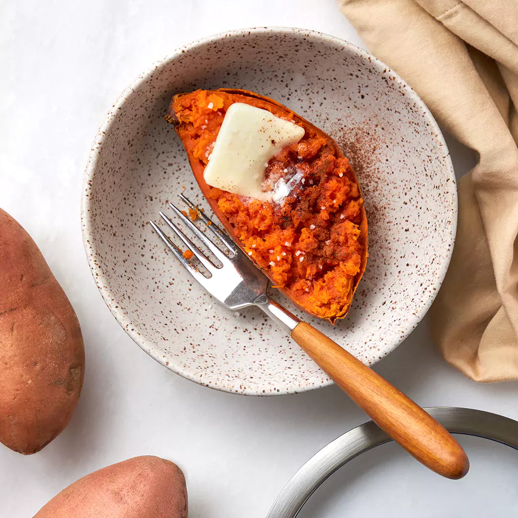 Perfectly cooked sweet potatoes made and served in the glass Anyday dish, providing tender and naturally sweet potatoes. This method ensures evenly cooked sweet potatoes, ideal for mashing, roasting, or adding to various recipes.