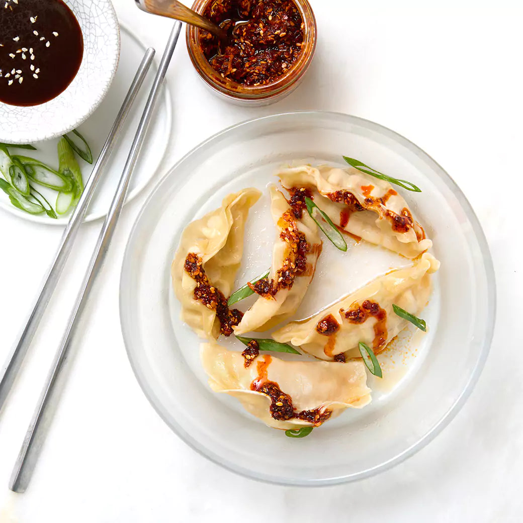 Perfectly cooked dumplings made and served in the glass Anyday dish, providing tender and flavorful bites. This method ensures evenly cooked dumplings, ideal for a quick and delicious snack or addition to meals.