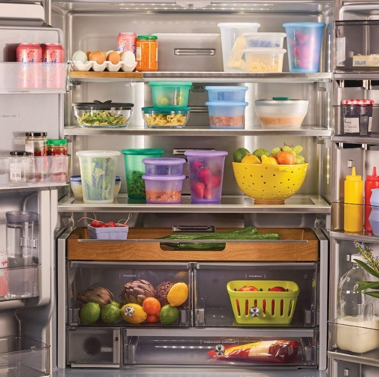 Anydeli meal prep containers stacked in a refrigerator